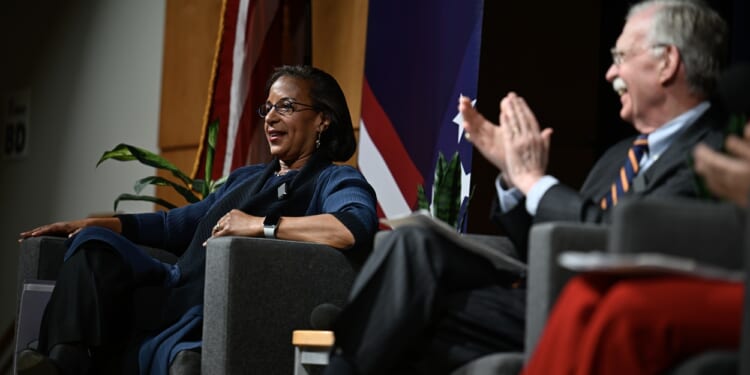 John Bolton and Susan Rice seated