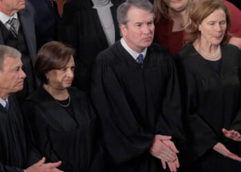 WASHINGTON, DC - FEBRUARY 24: U.S. Supreme Court Chief Justice John Roberts and Associate Justices Elena Kagan, Brett Kavanaugh and Amy Coney Barrett applaud at the conclusion of President Donald Trump's State of the Union address during a joint session of Congress at the Capitol on February 24, 2026, in Washington, DC. Trump delivered his address days after the Supreme Court struck down the administration's tariff strategy and amid a U.S. military buildup in the Persian Gulf threatening Iran. (Photo by Chip Somodevilla/Getty Images)