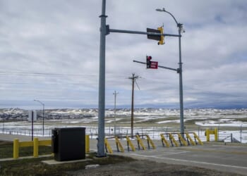 FBI arrests Chinese national accused of illegally documenting planes at U.S. air bases