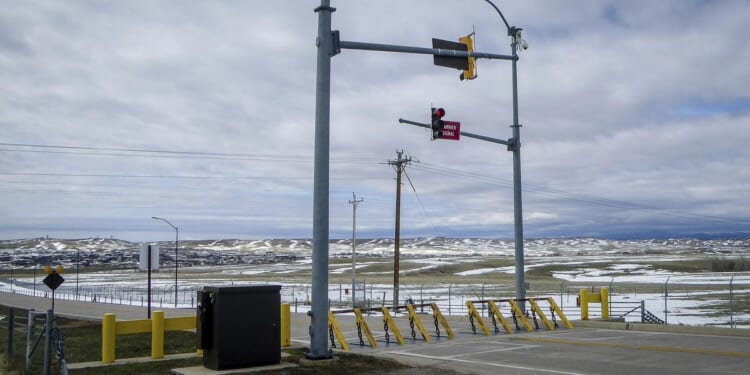 FBI arrests Chinese national accused of illegally documenting planes at U.S. air bases