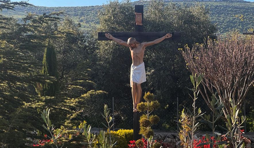 A new crucifix that was sent by Italy to replace the one that was defaced last week by an Israeli soldier stands in the Christian village of Debel, south Lebanon, Wednesday, April 22, 2026. (Houssam Naddaf via AP)