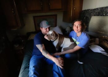 Growing wildfires blamed for death of Florida firefighter, destruction of 120 Georgia homes