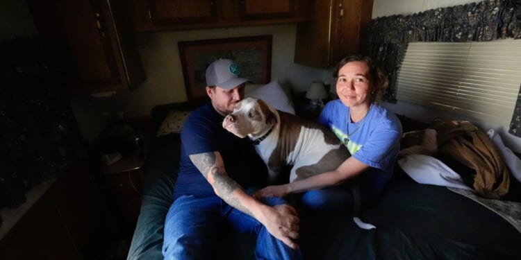 Growing wildfires blamed for death of Florida firefighter, destruction of 120 Georgia homes