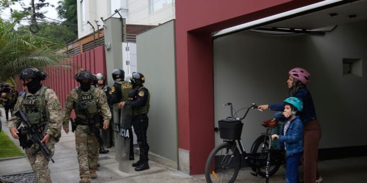 Peru police raid ex-election chief’s home as ballot shortages spark a widening probe