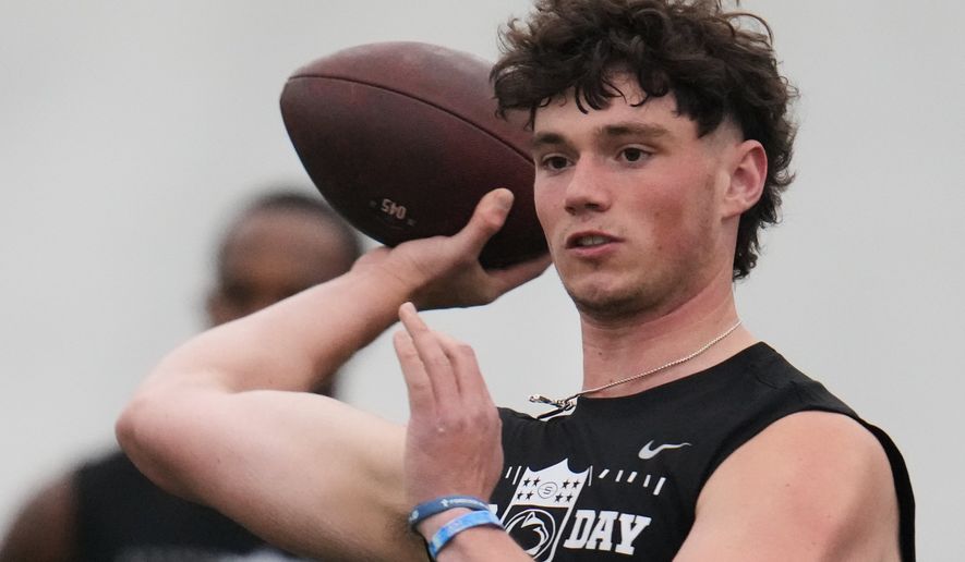 Penn State quarterback Drew Allar (15) throws during the school's NFL football pro day, Wednesday, March 18, 2026, in State College, Pa. (AP Photo/Gene J. Puskar, File)
