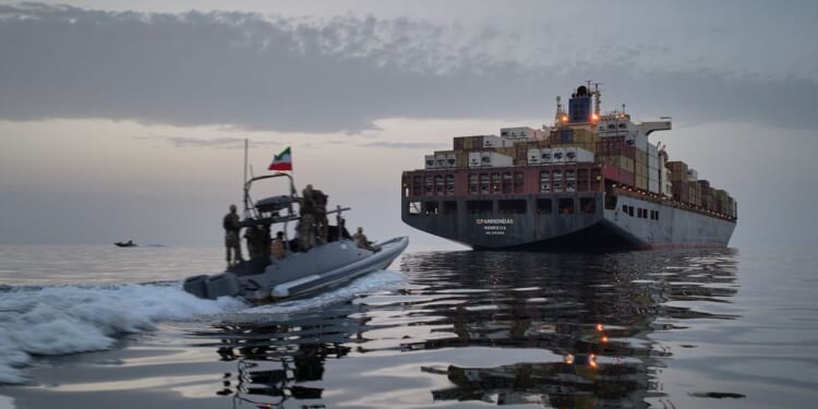 Iran promises to reopen strait if U.S. agrees to postpone talks on nuclear program