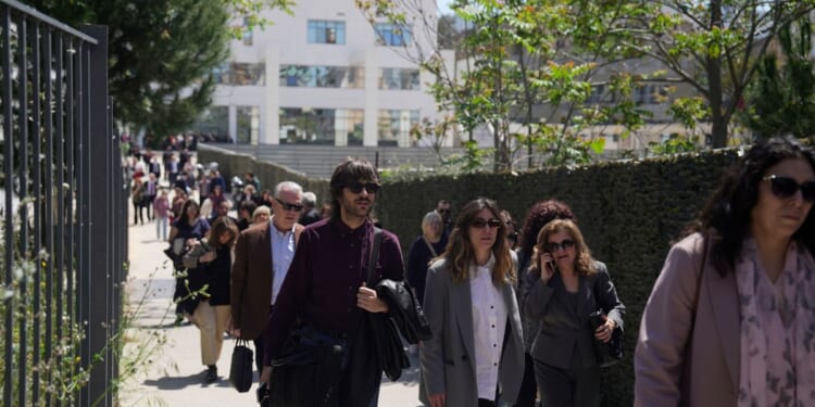 Gunman, reportedly age 89, opens fire at 2 locations in Greek capital, wounding several people