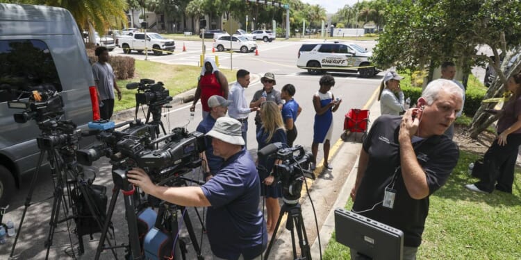 A judge orders suspect to be held without bond in 2 USF student killings