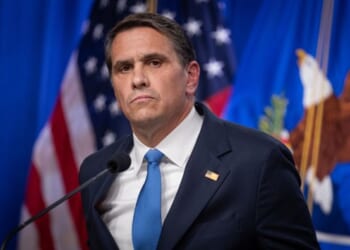 Acting Attorney General Blanche stands at a podium in the Department of Justice press room on April 21, 2026.