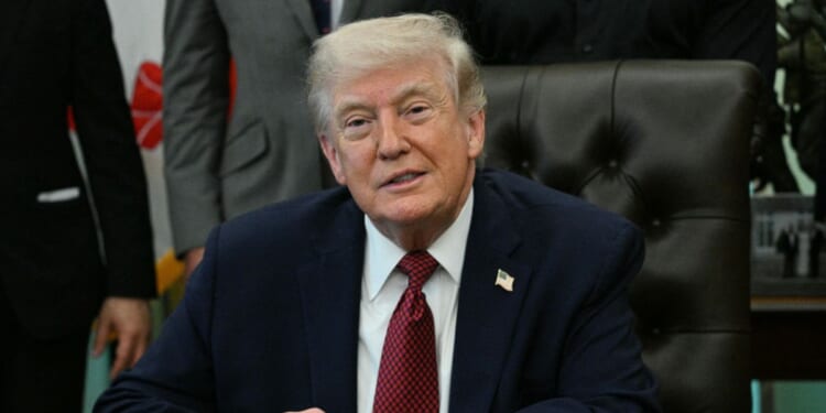 President Donald Trump speaks after signing an executive order in the Oval Office of the White House in Washington, D.C., on April 18, 2026.
