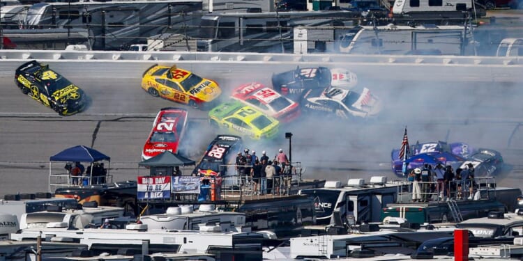 Tyler Reddick, driver of the #45 Rockstar Energy Drink Toyota, Joey Logano, driver of the #22 Shell-Pennzoil Ford, Josh Berry, driver of the #21 Motorcraft/Quick Lane Ford, Austin Cindric, driver of the #2 Menards /FrogTape Ford, Connor Zilisch, driver of the #88 Red Bull Chevrolet, and Bubba Wallace, driver of the #23 Xfinity Toyota, spin after an on-track incident during the NASCAR Cup Series Jack Link's 500 at Talladega Superspeedway Sunday in Talladega, Alabama.