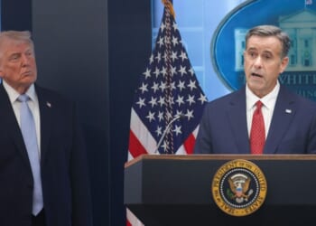 CIA Director John L. Ratcliffe speaks as President Donald Trump looks on during a news conference Monday at the White House in Washington, D.C. Ratcliffe and Trump spoke about the successful military mission to rescue a weapons systems officer whose F-15E Strike Eagle was shot down Friday in Iran.