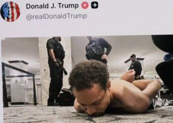 A cell phone displays a social media post picturing a suspect identified as Cole Allen restrained on the floor after Saturday's assassination attempt against President Donald Trump and members of his administration in a shooting at the White House Correspondents' Association dinner in Washington, D.C.