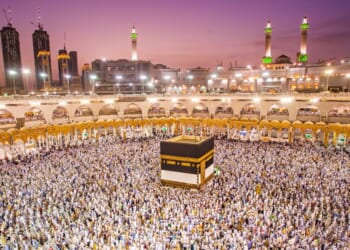 Muslim pilgrims from all around the world doing tawaf, praying around the Kaabah in Mecca, Saudi Arabia.