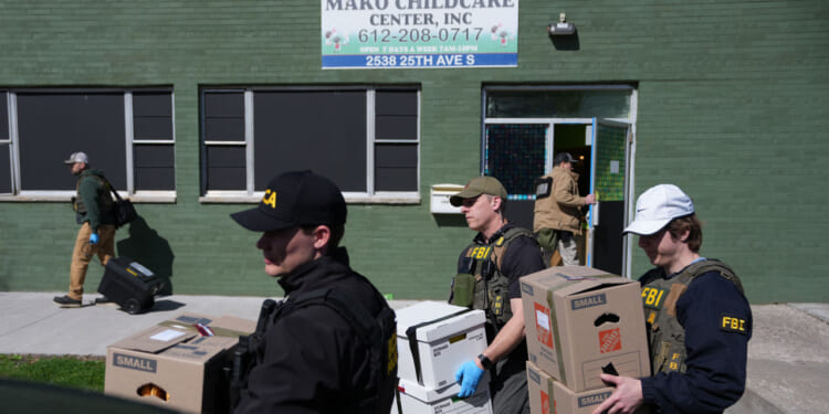 Law enforcement agents raid Mini Childcare (formerly Mako Childcare) in Minneapolis.