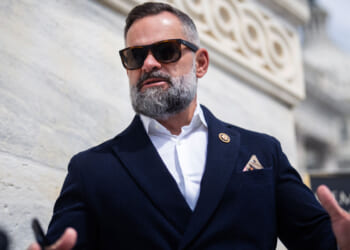 Cory Mills, R-Fla., talks with reporters on the House steps of the U.S. Capitol.