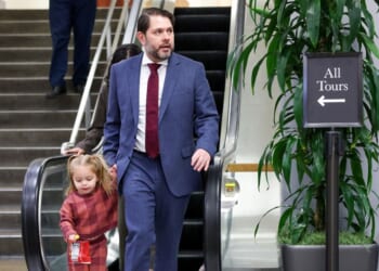 Sen. Ruben Gallego walks through the Senate subway with his daughter Isla during a vote on March 4, 2026, in Washington, D.C.
