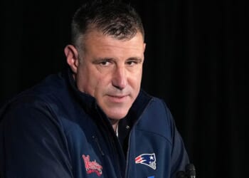 Head coach Mike Vrabel of the New England Patriots will reportedly miss part of the NFL draft Saturday.