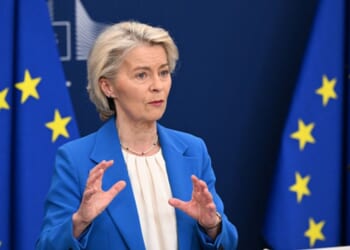 European Union President Ursula Von Der Leyen stands at a podium as she speaks to the press on April 13, 2026.