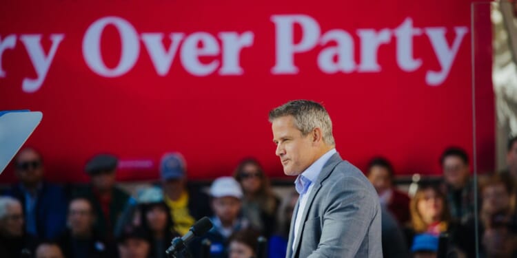 Former Rep. Adam Kinzinger speaks during a rally for Vice President Kamala Harris in Washington Crossing, Pennsylvania, on Wednesday, Oct. 16, 2024.