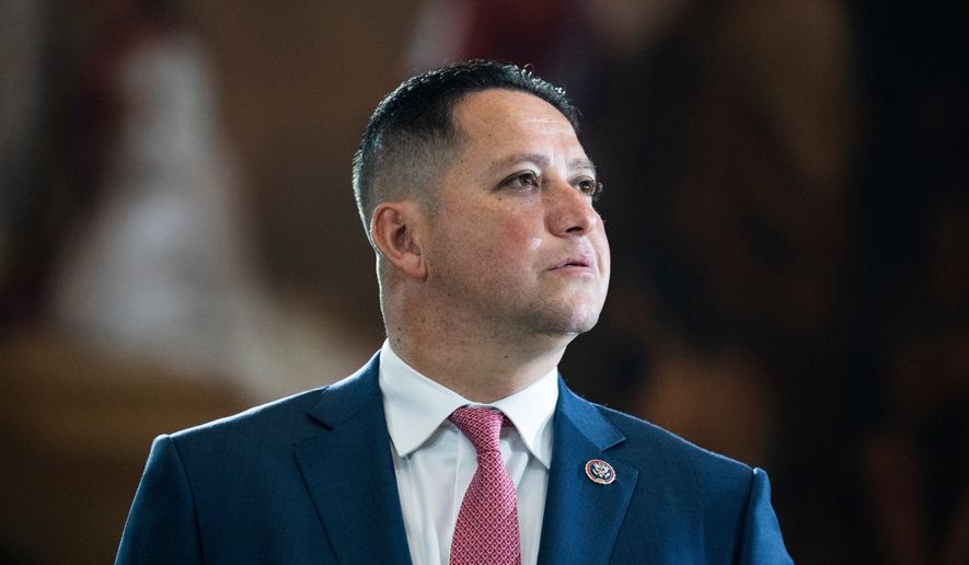 Rep. Tony Gonzales, R-Texas, is seen before the flag-draped casket bearing the remains of Hershel W. "Woody" Williams, who lies in honor in the U.S. Capitol, July 14, 2022, in Washington. (Tom Williams/Pool photo via AP, File)