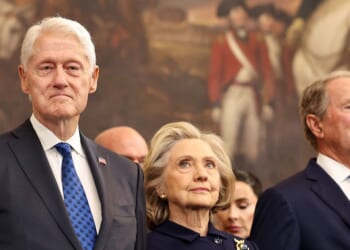 Former President Bill Clinton, former Secretary of State Hillary Clinton, and former President George W. Bush attend the inauguration of President Donald Trump in the Rotunda of the U.S. Capitol on Jan. 20, 2025, in Washington, D.C.