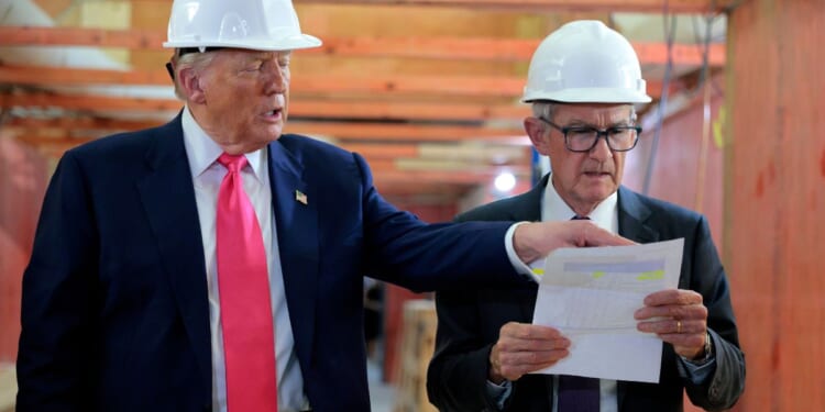 President Donald Trump and Federal Reserve Chair Jerome Powell tour the Federal Reserve’s $2.5 billion headquarters renovation project on July 24, 2025, in Washington, D.C.