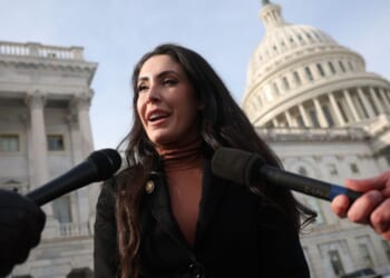 GOP Rep. Anna Paulina Luna of Florida, pictured speaking to reporters in February, said the Justice Department should either prosecute everyone who profits off of what they know or they should not prosecute anyone.