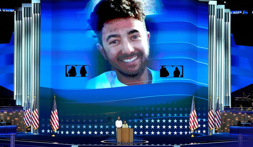FILE - Jon Polin, left, and Rachel Goldberg, parents of Hersh Goldberg-Polin, pictured on screen speak during the Democratic National Convention Wednesday, Aug. 21, 2024, in Chicago. (AP Photo/J. Scott Applewhite, File)