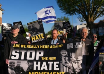 People participate in an "Anti-Zionism = Terrorism" protest, organized by the pressure group Stop the Hate in Golders Green following the stabbing of two people earlier on April 29, 2026, in the Golders Green area of London, England.