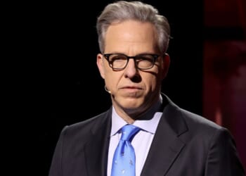 "Jokes are jokes," Jake Tapper, seen in a 2024 photo, said this week, in defense of his friend Jimmy Kimmel. However, not long ago he hinted Aaron Rodgers should be booted from the airwaves for making a joke about Kimmel.