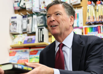 Author James Comey, former FBI Director, signs copies of his books for fans at the Barnes & Noble Upper West Side on May 19, 2025 in New York City. Comey sat with Esposito to discuss his career and new book "FDR DRIVE," the third of a series of fictional crime novels featuring attorney Nora Carleton. (Photo by Michael M. Santiago/Getty Images)