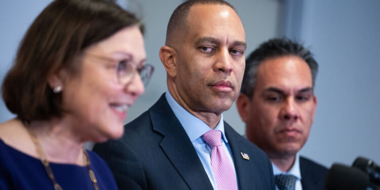 Hakeem Jeffries, D-N.Y., center, Reps. Suzan DelBene, D-Wash., and Pete Aguilar, D-Calif.