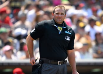 MLB umpire Brock Ballou looks on at a game between the San Diego Padres and the St. Louis Cardinals at Petco Park on Aug. 3, 2025.