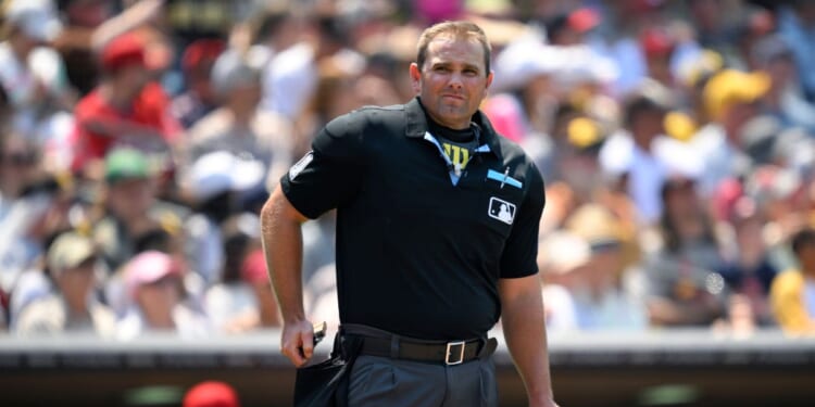 MLB umpire Brock Ballou looks on at a game between the San Diego Padres and the St. Louis Cardinals at Petco Park on Aug. 3, 2025.
