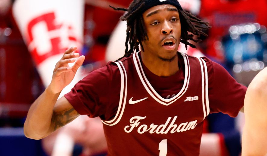 Fordham guard Will Richardson defends during an NCAA college basketball game in Dayton, Ohio, Saturday, Feb. 17, 2024. (AP Photo/Paul Vernon, File)