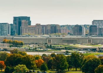 A helicopter shot of the Pentagon, the headquarters of the United States Department of War, in Arlington County, Virginia, across the Potomac River from Washington, D.C.