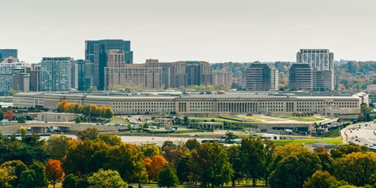 A helicopter shot of the Pentagon, the headquarters of the United States Department of War, in Arlington County, Virginia, across the Potomac River from Washington, D.C.