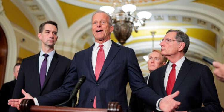 Senate Majority Leader John Thune speaks with the press following weekly policy luncheons at the U.S. Capitol on April 21, 2026, in Washington, D.C.