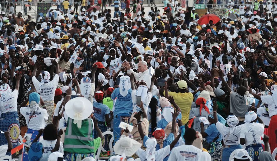 Pope Leo XIV arrives at the esplanade in front of the Sanctuary of Mama Muxima, in Muxima, Angola, Sunday, April 19, 2026. (AP Photo/Andrew Medichini)