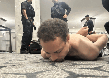 Cole Tomas Allen being detained by police after storming the White House Correspondents' Dinner