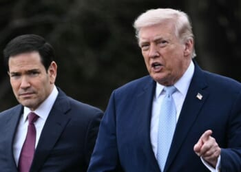 President Donald Trump walks with Secretary of State Marco Rubio as he departs from the South Lawn of the White House in Washington, D.C., on March 20, 2026, for his Mar-a-Lago residence, where he will spend the weekend.