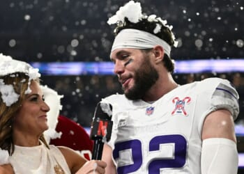 Diana Russini, left, interviews Harrison Smith #22 of the Minnesota Vikings on Netflix after the game against the Detroit Lions on Dec. 25 in Minneapolis, Minnesota.