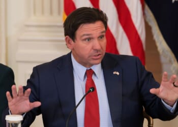 Florida Governor Ron DeSantis speaks at a roundtable discussion on college sports in the East Room of the White House on March 6, 2026.