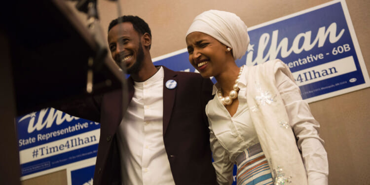 Ilhan Omar, candidate for State Representative for District 60B in Minnesota, with her husband Ahmed Hirisi.