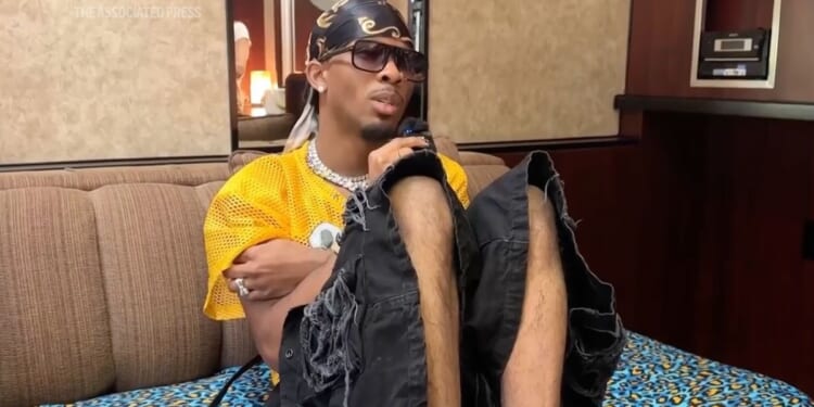 Singer D4vd charged with murder of girl, 14, found dismembered in his car