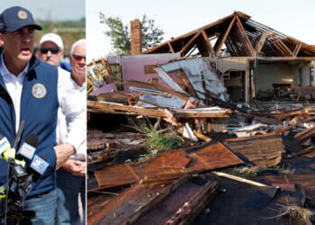 Oklahoma Gov. Kevin Stitt speaks to media while touring tornado damage Friday in a neighborhood that was damaged by a tornado Thursday in Enid, Oklahoma.