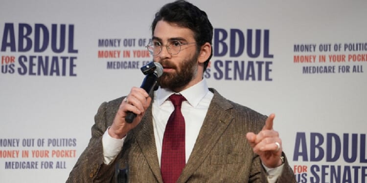 Leftist influencer Hasan Piker is pictured speaking April 7 at a campaign rally for Abdul El-Sayed, a progressive Democrat seeking the party's nomination for a Michigan seat in the U.S. Senate.