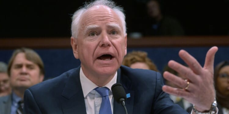 Minnesota Gov. Tim Walz, seen in a March 4 photo, tried to take partial credit for the raid, only to get called out by those who recall what actually happened.