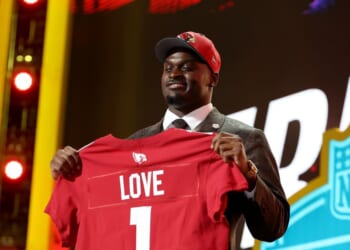 Jeremiyah Love of Notre Dame celebrates after being selected third overall pick by the Arizona Cardinals during Round One of the 2026 NFL Draft at Acrisure Stadium on April 23, 2026, in Pittsburgh, Pennsylvania.